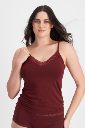 Martine (She/Her) wears size 14DD and is 175cm tall with 82cm chest and 76cm waist